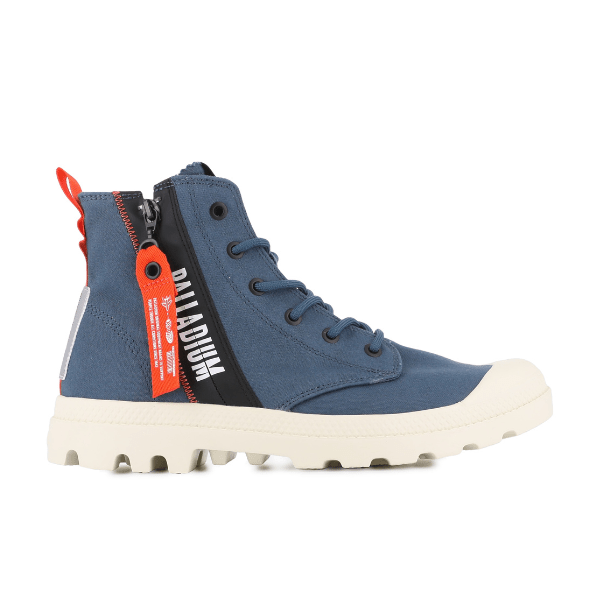 Palladium Pampa Hi Outzip Overlab boot in Mood Indigo blue with side zip, contrast white outsole, and branded red zip tag.