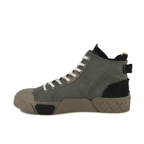 Palladium Ace City Shell Chukka in Olive Night – angled side view showing olive green ripstop upper, black accents and earthy brown rubber outsole