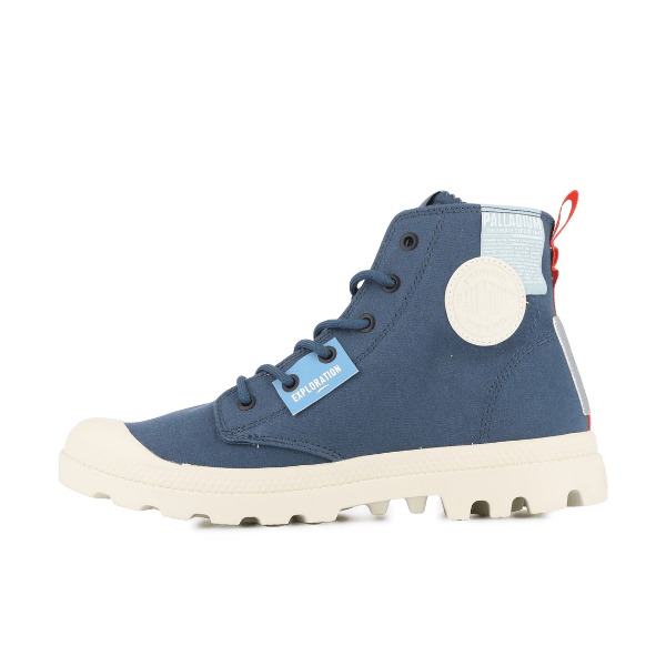 Alternate side of Palladium Pampa Hi Outzip Overlab boot in Mood Indigo featuring cream logo badge and ‘Exploration’ tag.