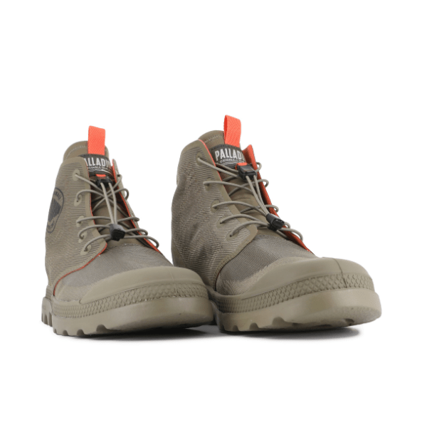 Pair of Palladium Pampa Lite Travel VT boots in Dusky Green, side-by-side with orange tongue tabs.