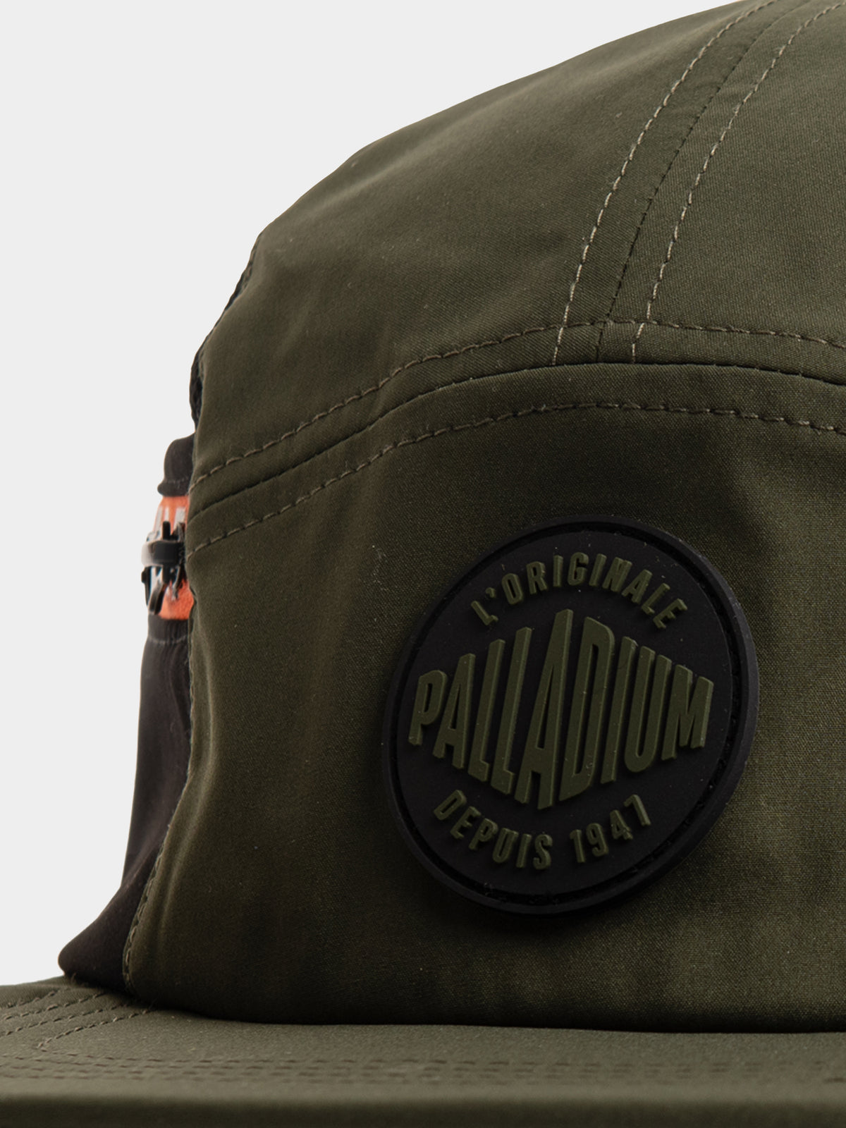 Palladium 5 Panel Military Cap Olive - Close-up of L'Originale Palladium Depuis 1947 rubber badge on olive fabric
