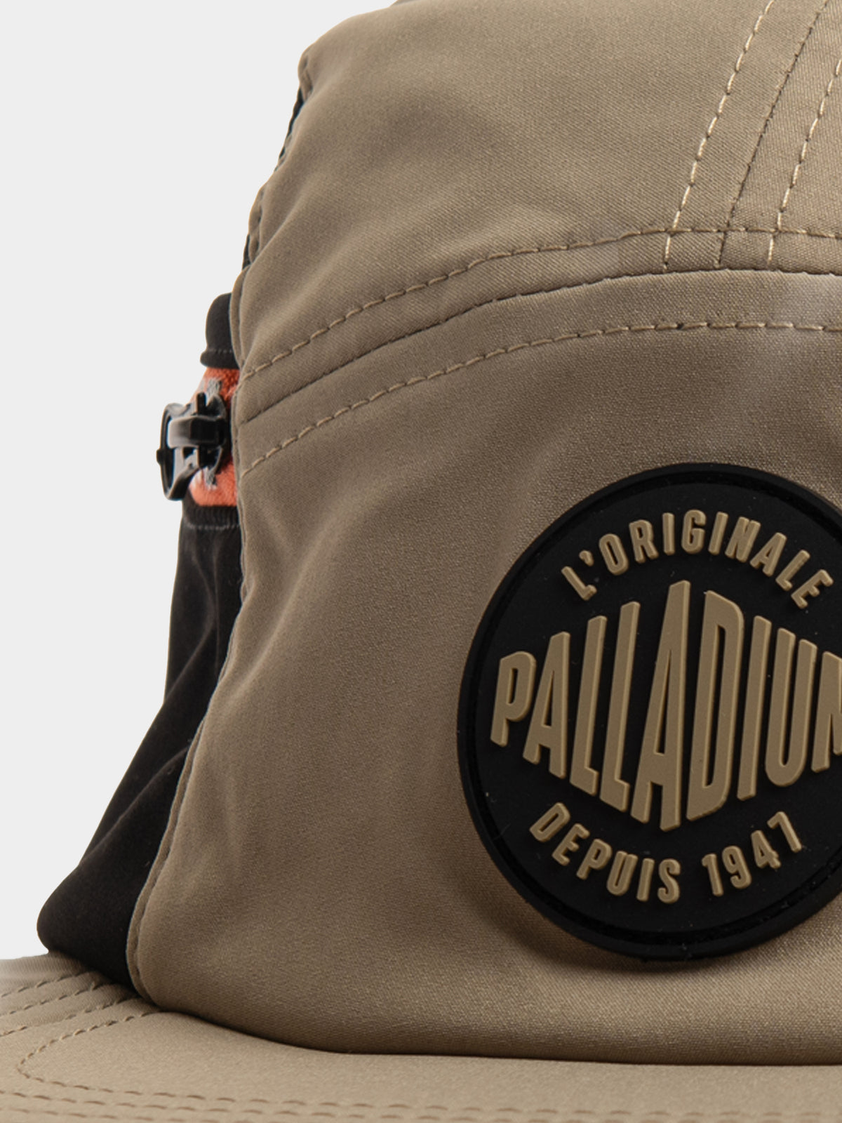 Palladium 5 Panel Military Cap Khaki - Close-up of L'Originale Palladium Depuis 1947 rubber badge on khaki fabric