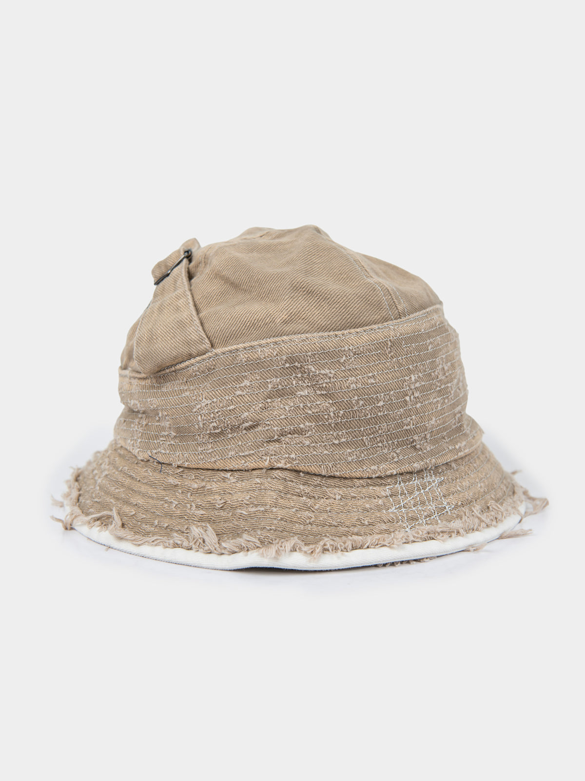 Palladium Frayed Bucket Hat in Stone beige distressed canvas, back view showing adjustable buckle strap