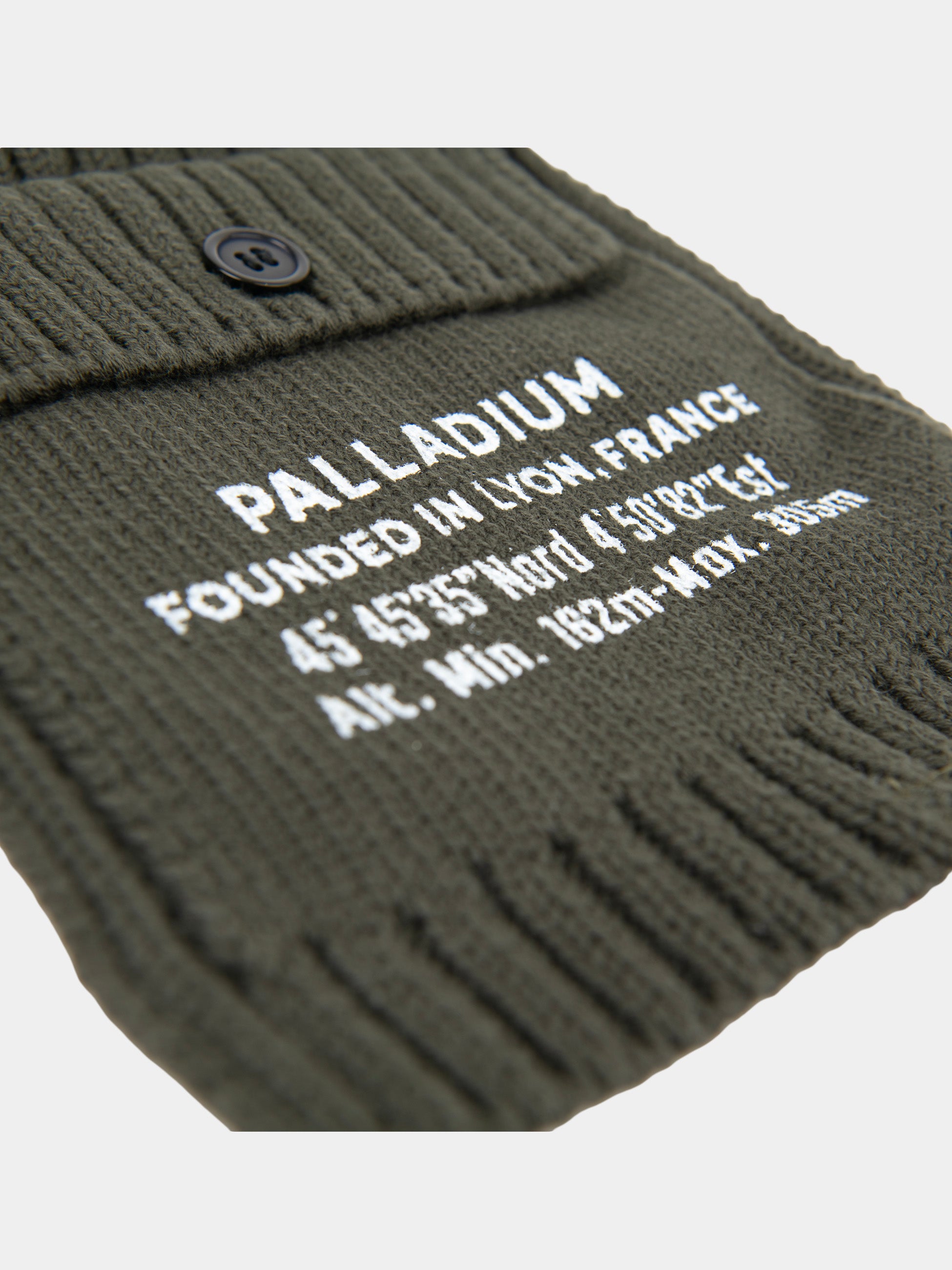 Palladium Cargo Beanie in Olive close-up showing embroidered Palladium branding and button-detail knit panel